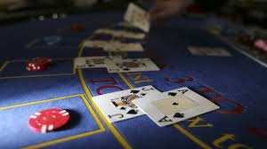 Antarmuka aplikasi hokbentoto di perangkat Android menampilkan menu sportsbook dan live casino